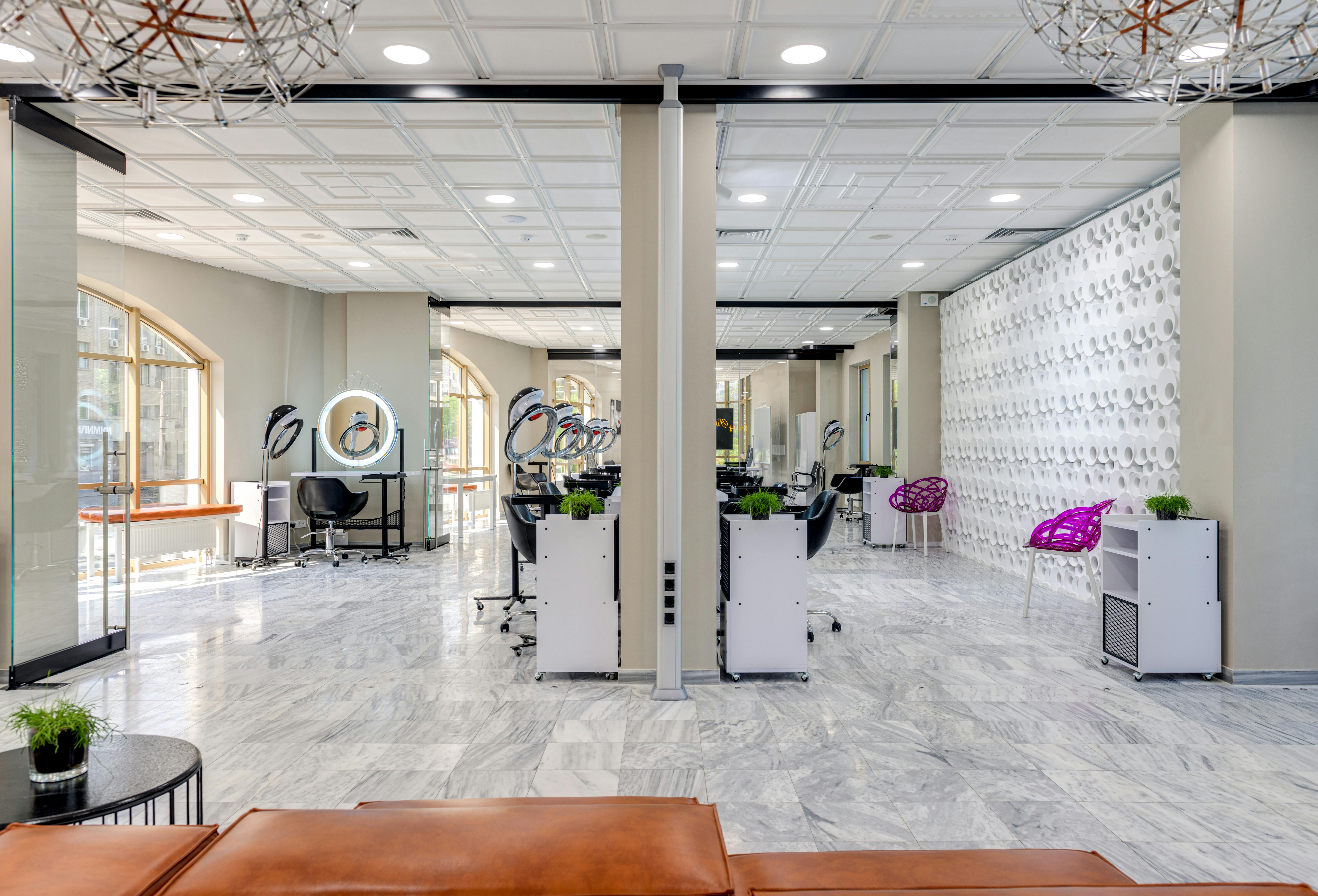 Spacious salon interior with styling mirrors and seating